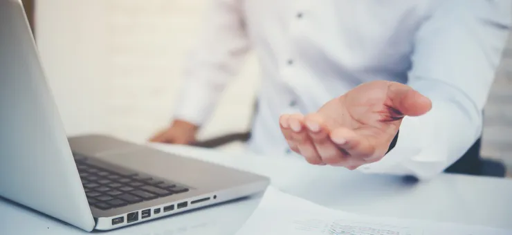 business professional analyzing benefits of outsourcing to Latin America for cost efficiency and scalability