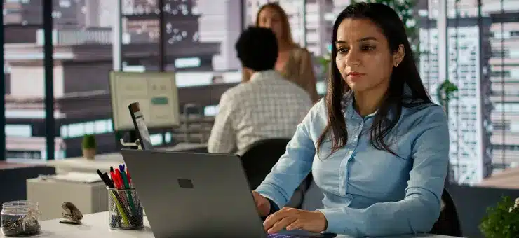 operations manager overseeing workflows while comparing nearshore teams and traditional outsourcing models - Nearbirdge