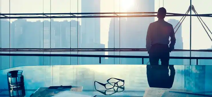 executive evaluating market opportunities to scale operations through outsourcing solutions with Nearbridge