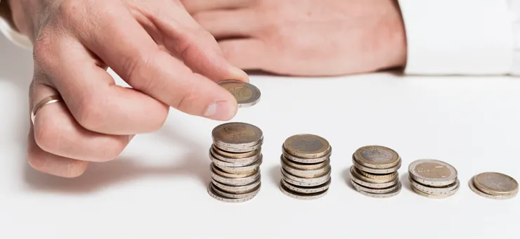 Business cost reduction concept showing improved efficiency through outsourcing solutions with Nearbridge