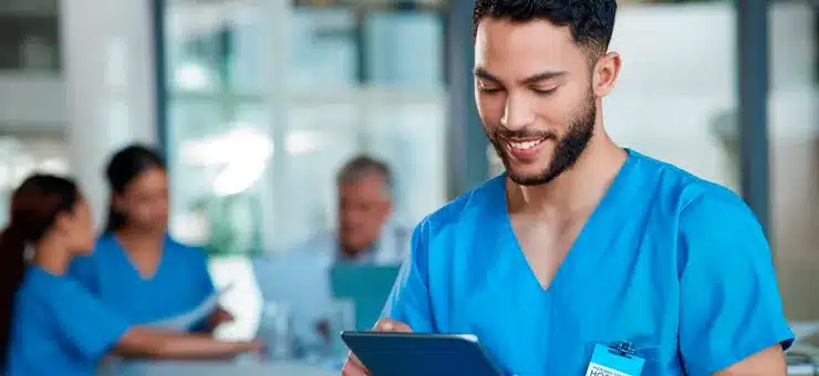 medical team analyzing patient data and workflows to improve operations with outsourced support - Nearbridge