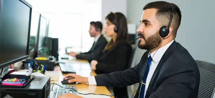 bilingual customer support agent with headset providing nearshore outsourcing services for U.S. companies